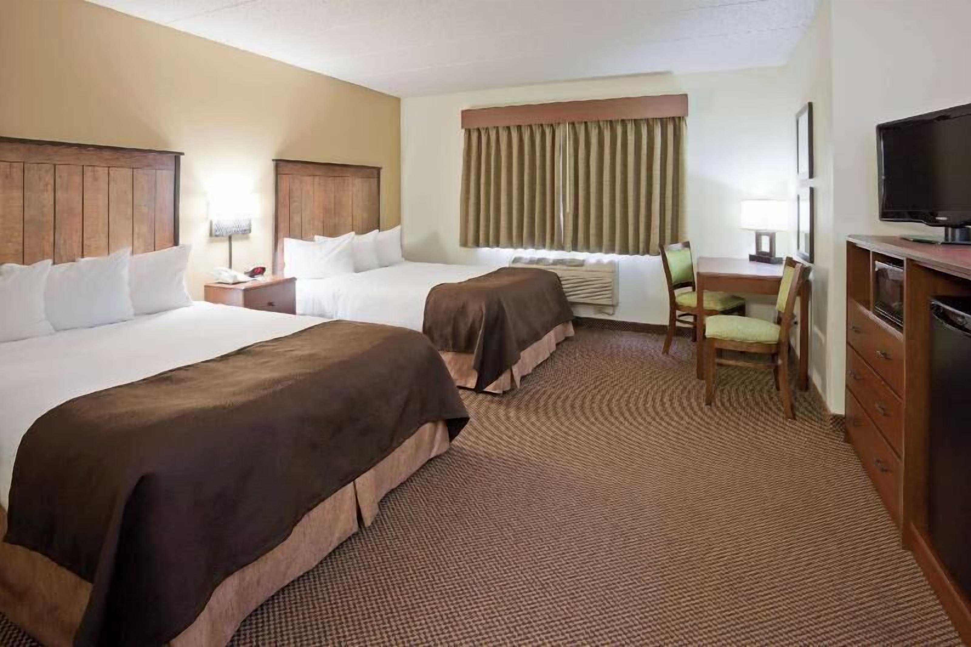 Premium bedding, desk, blackout drapes, iron/ironing board