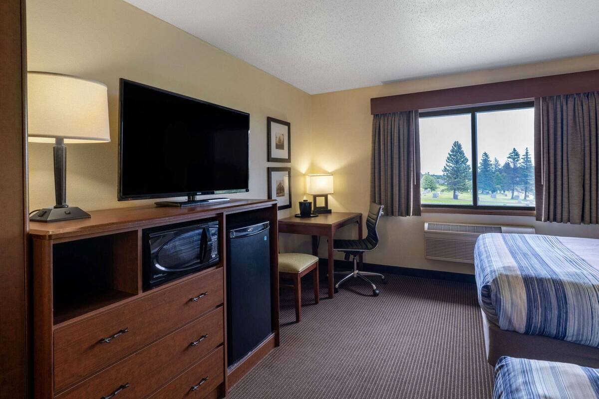 Premium bedding, desk, blackout drapes, iron/ironing board