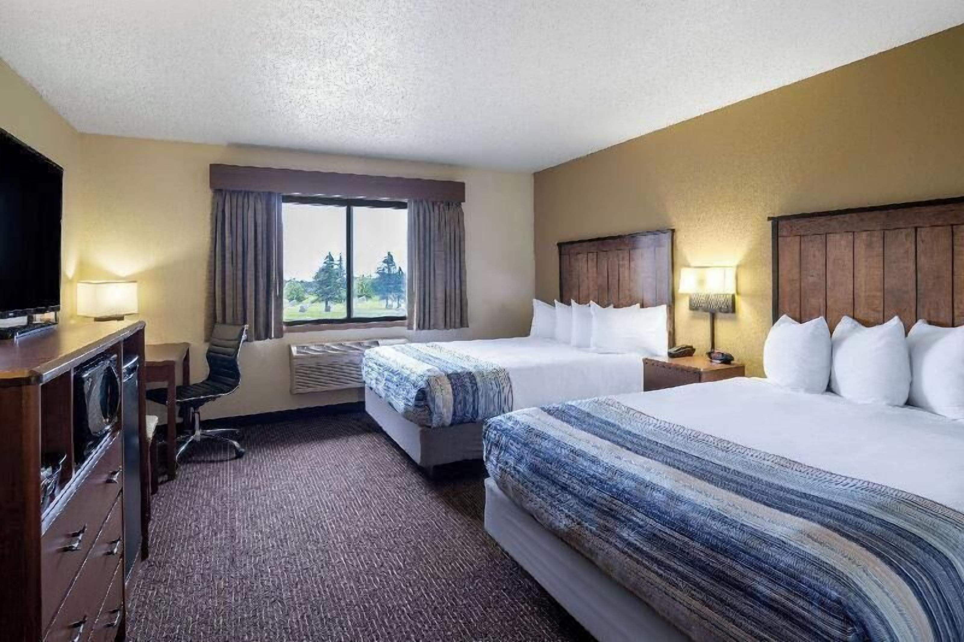 Premium bedding, desk, blackout drapes, iron/ironing board