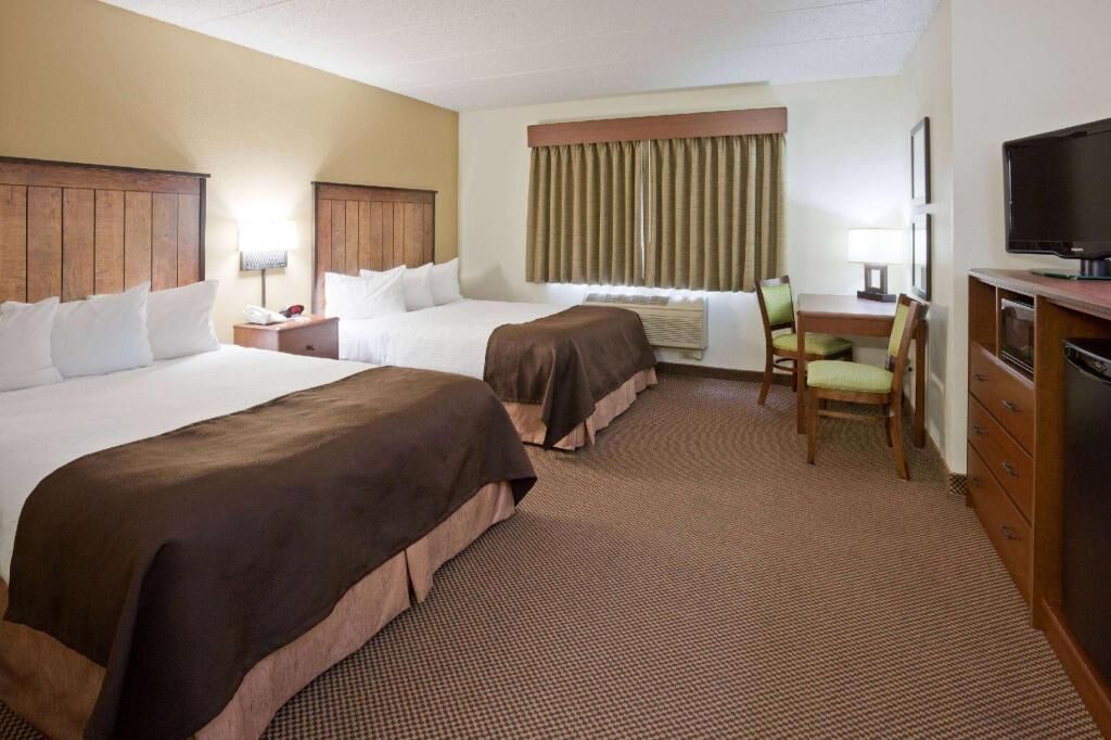 Premium bedding, desk, blackout drapes, iron/ironing board