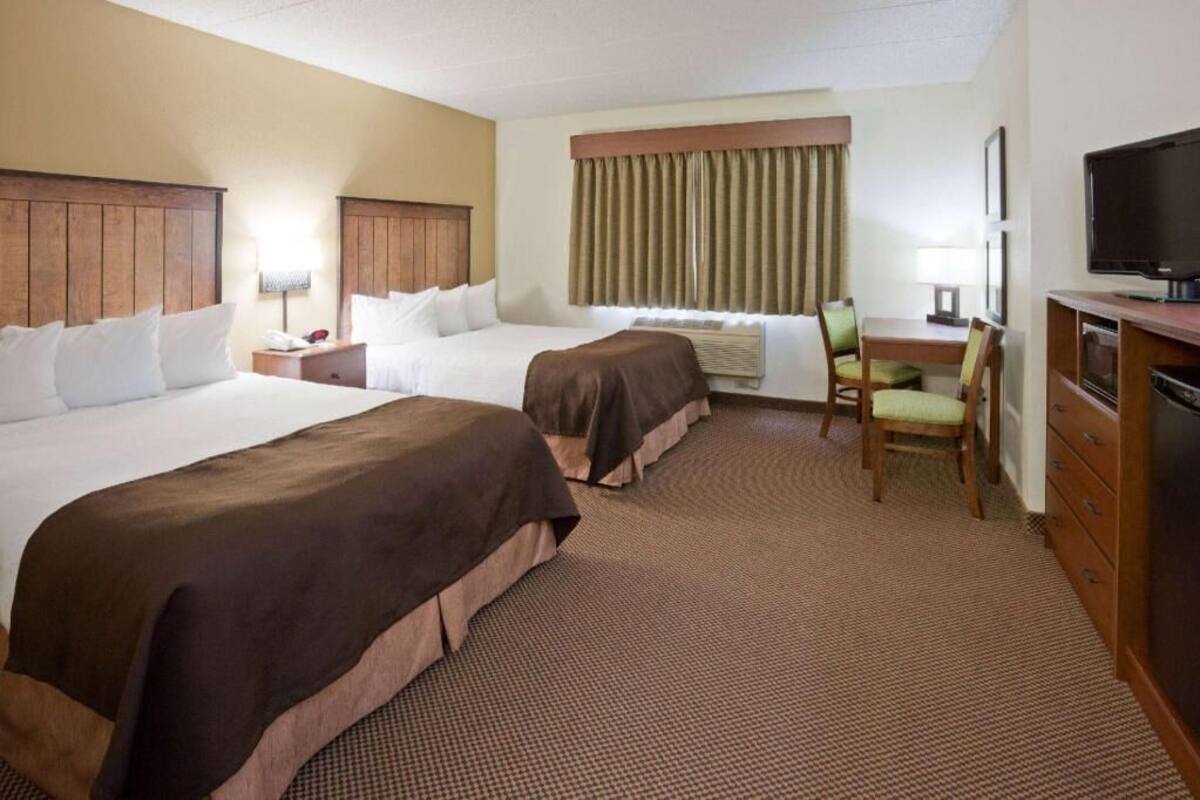 Premium bedding, desk, blackout drapes, iron/ironing board