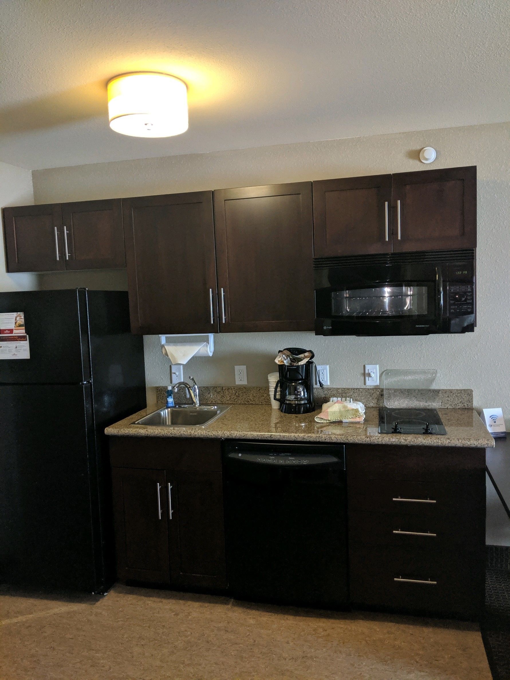 full-sized fridge, microwave, oven, stovetop