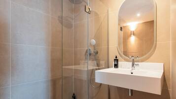 Shower, eco-friendly toiletries, hair dryer, towels