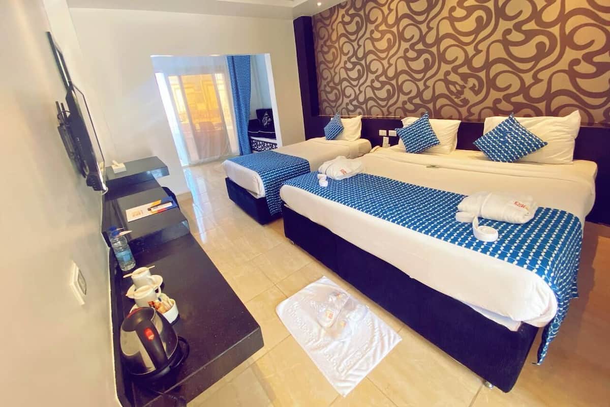 Superior Sea View | Minibar, in-room safe, iron/ironing board, free WiFi