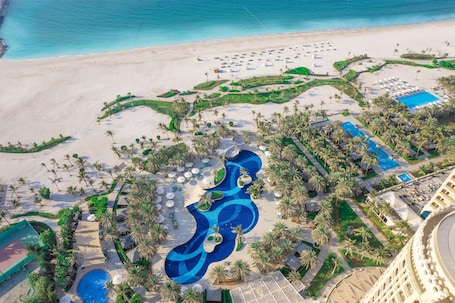 Private beach, white sand, free beach cabanas, sun loungers