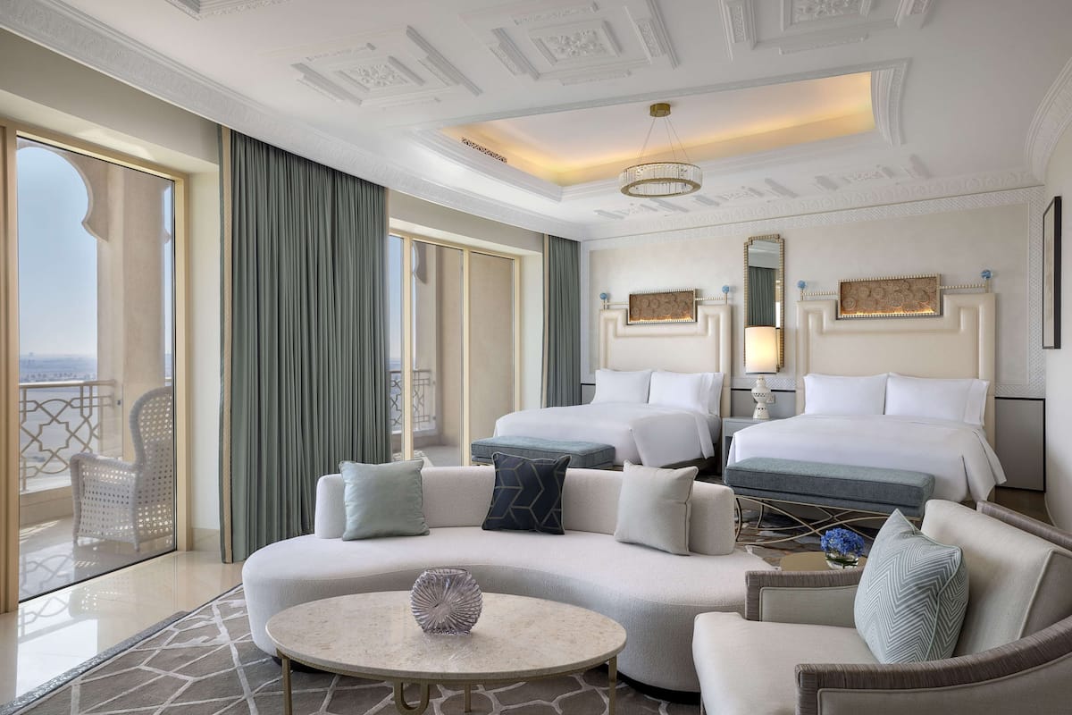 Two Queen Beds Premier Golf Course View Room | Living area