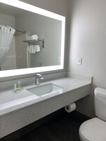 Deluxe Room, 1 King Bed, Non Smoking, Kitchenette | Bathroom | Combined shower/tub, free toiletries, towels