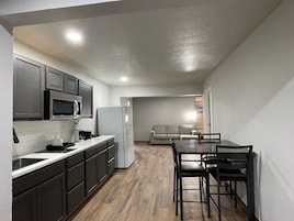 Suite, Multiple Beds, Non Smoking | Private kitchen | Fridge, microwave