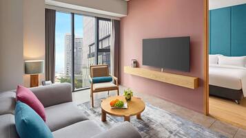 Apartment, 1 Bedroom | Minibar, in-room safe, desk, laptop workspace