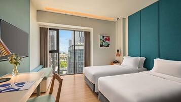 Studio, 2 Single Beds | Minibar, in-room safe, desk, laptop workspace