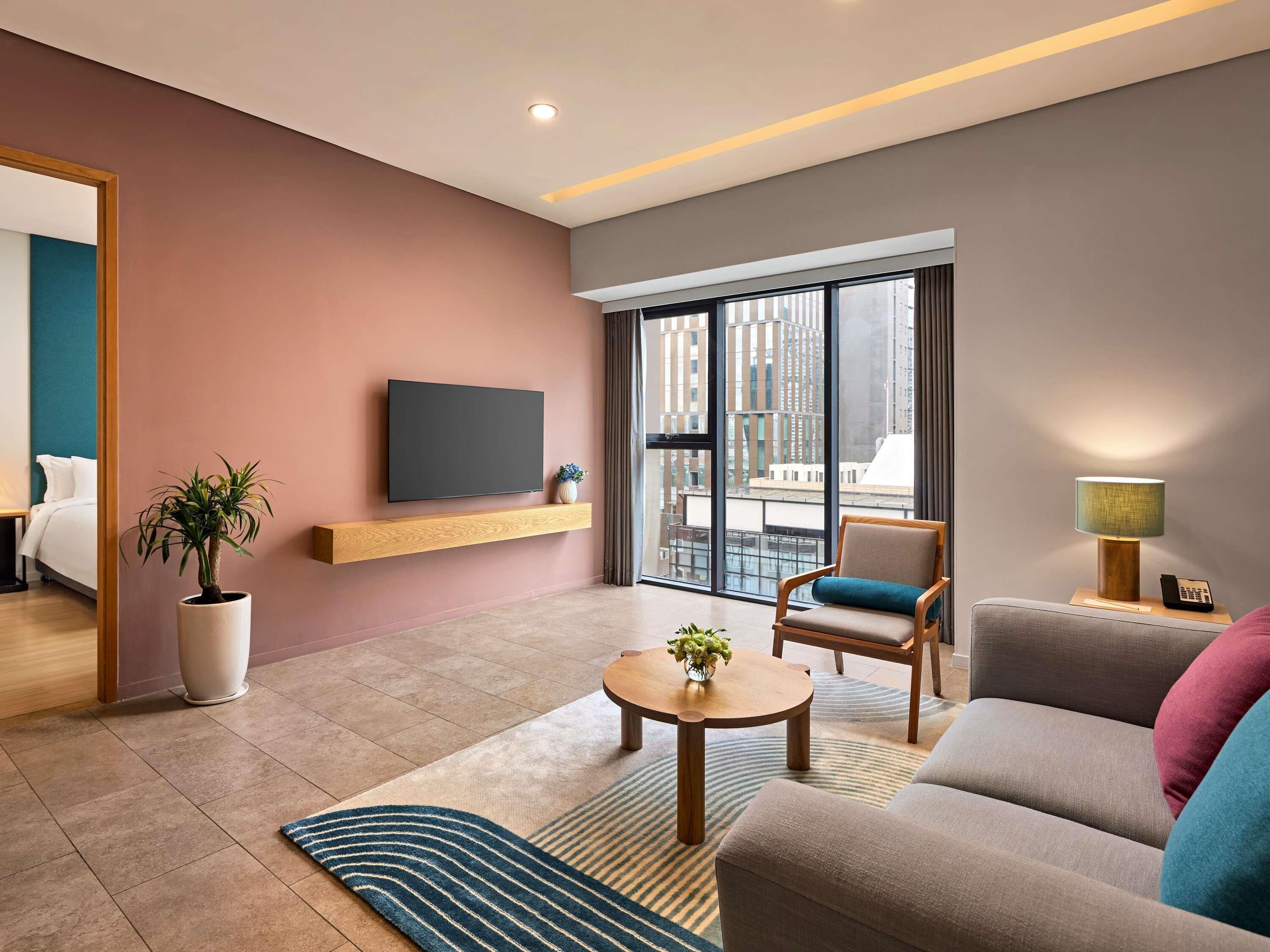 Deluxe Apartment, 1 Bedroom | Minibar, in-room safe, desk, laptop workspace