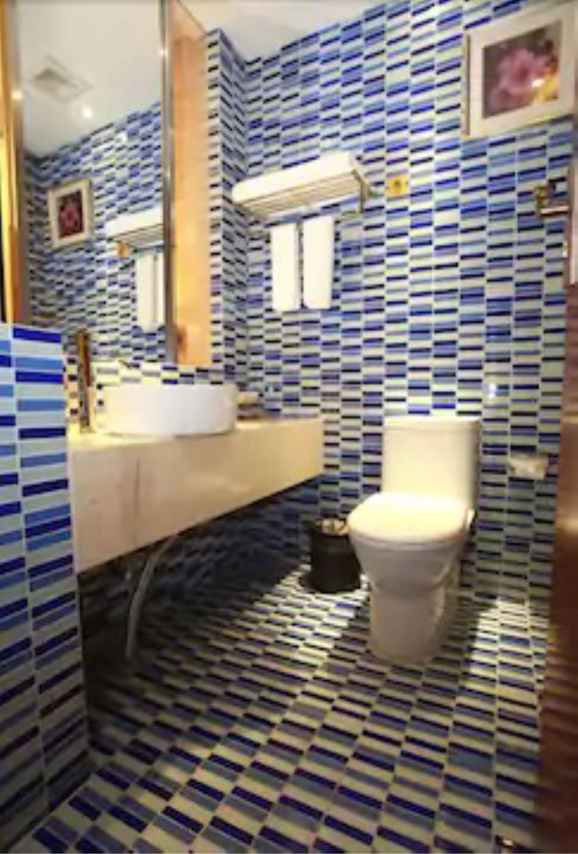 Shower, free toiletries, hair dryer, slippers