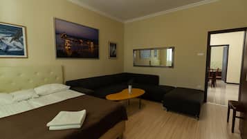 Family Apartment, 3 Bedrooms | 2 bedrooms, in-room safe, desk, laptop workspace