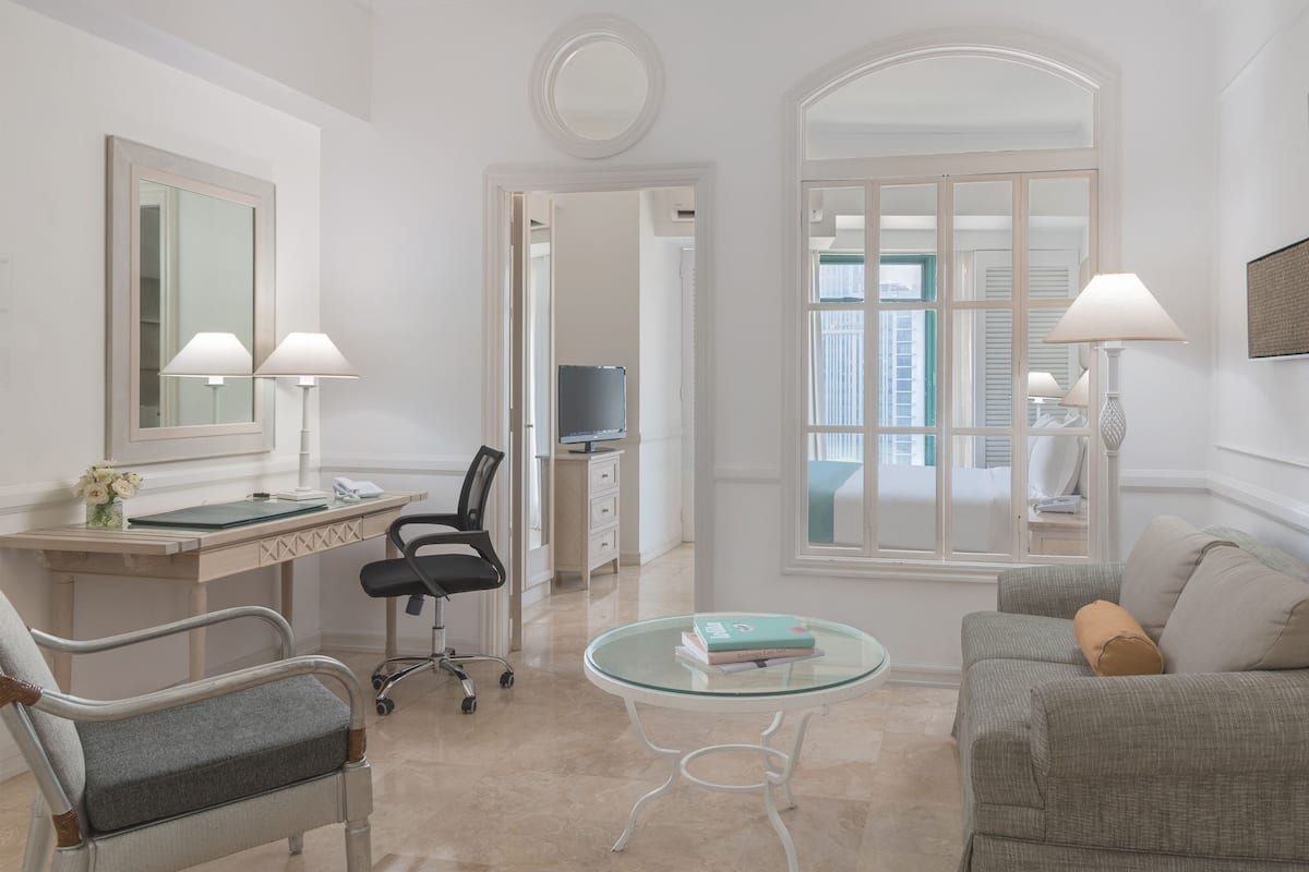 Suite, 1 Bedroom | 1 bedroom, in-room safe, desk, iron/ironing board