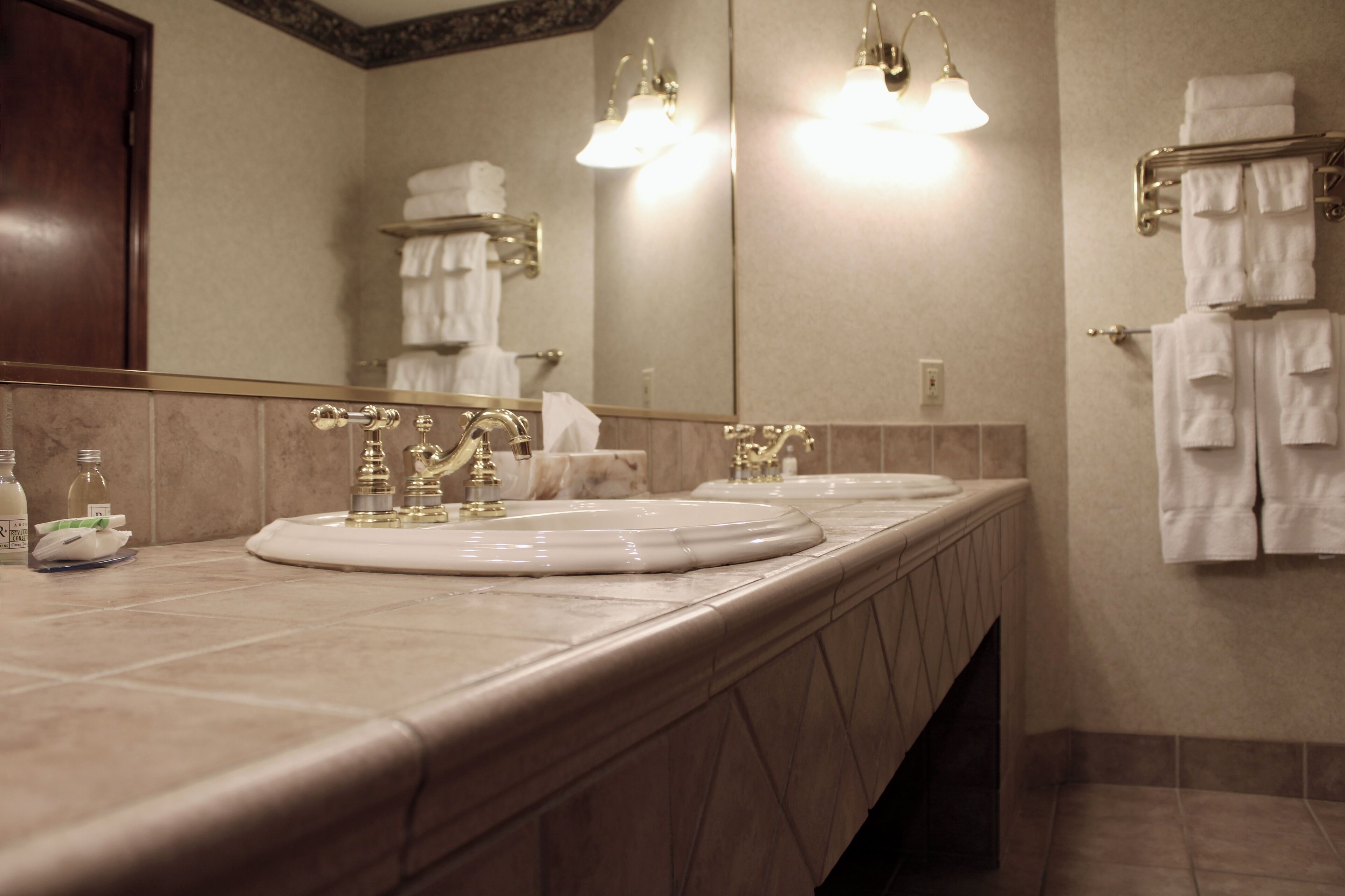 presidential studio suite | bathroom | free toiletries, hair dryer, towels, soap