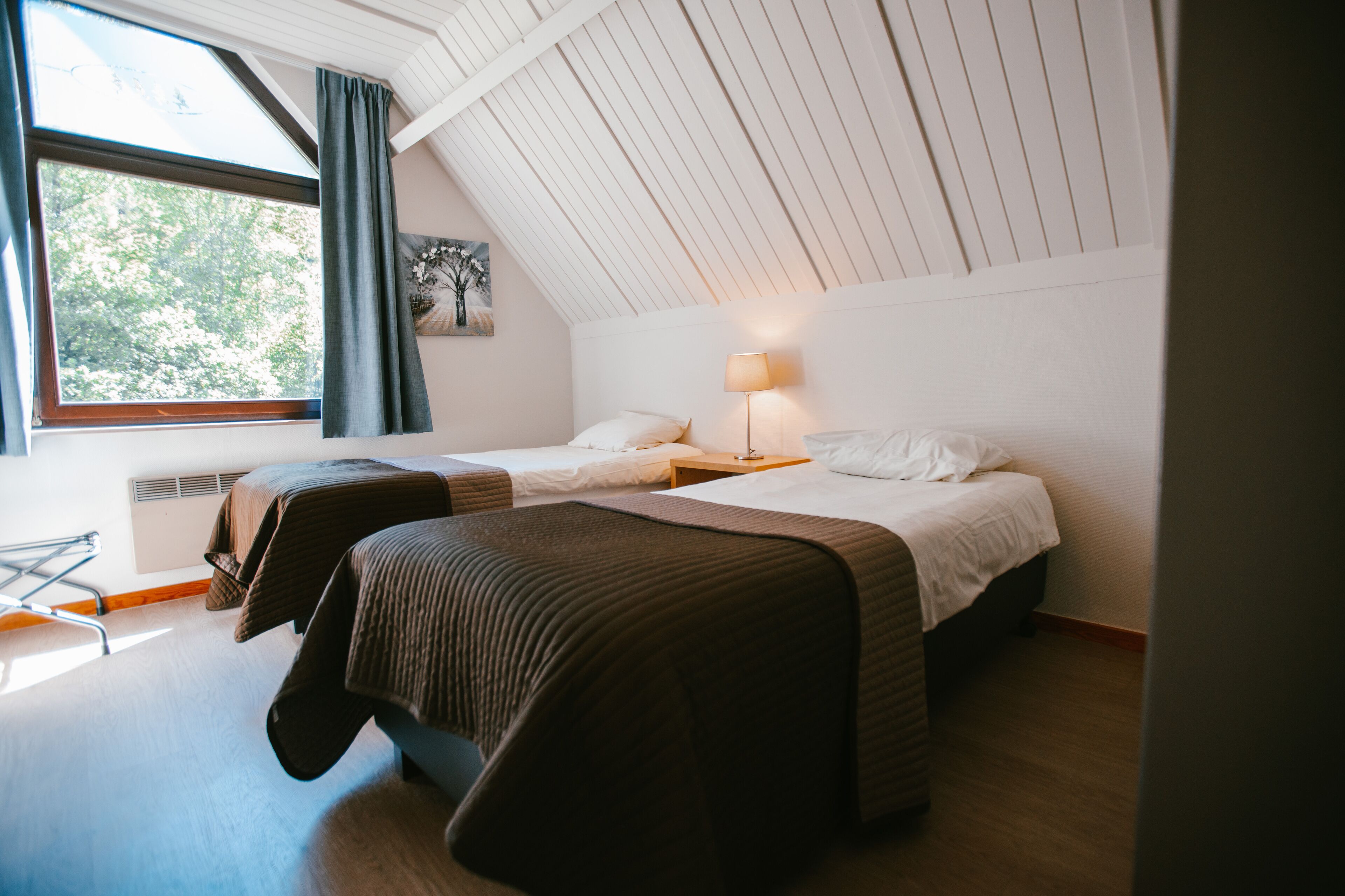 family cottage, 2 bedrooms, kitchen, garden area | blackout curtains, cots/infant beds, free wifi, bed sheets