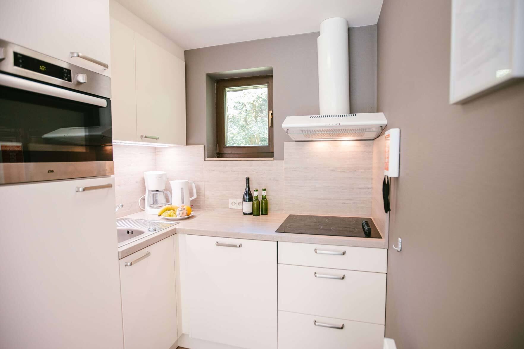 family cottage, 2 bedrooms, kitchen, garden area | private kitchen | fridge, microwave, dishwasher, electric kettle