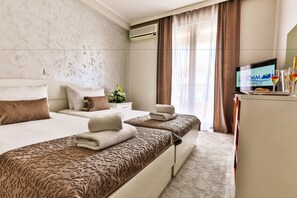 Standard Double or Twin Room, Balcony, Sea View | Minibar, in-room safe, desk, cribs/infant beds - Hotel Magnolija (Becici)