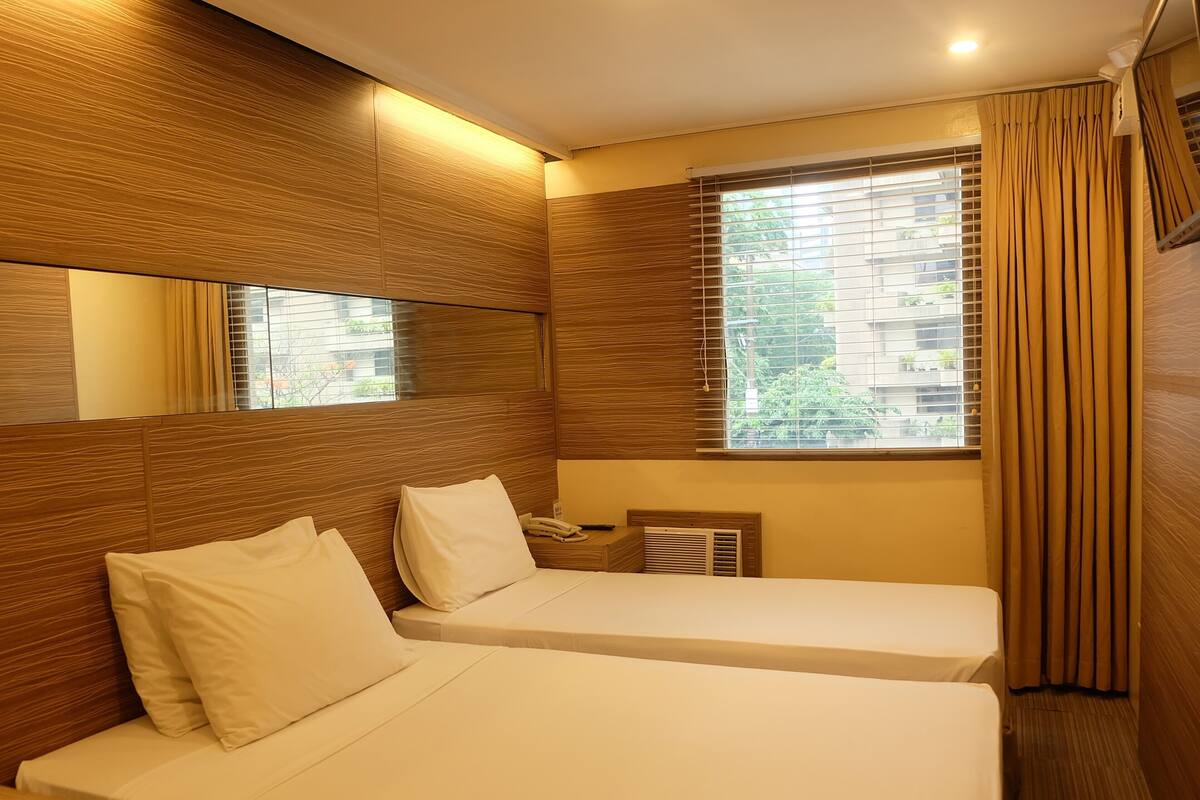 Kamar Triple Deluks | Setrika/meja setrika