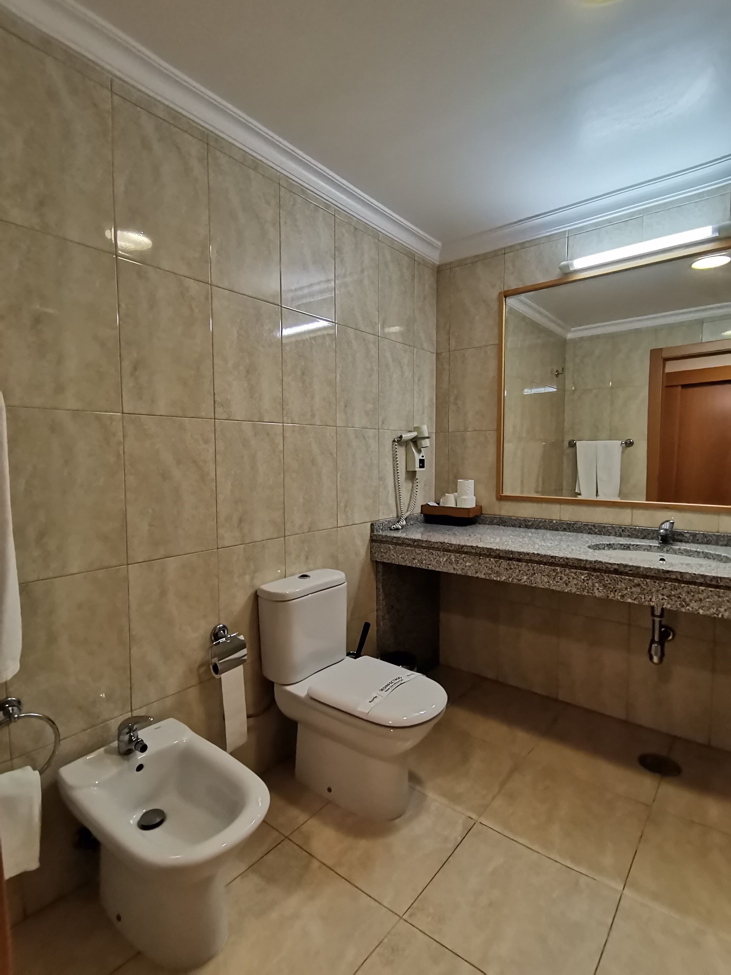 free toiletries, hair dryer, bidet, towels