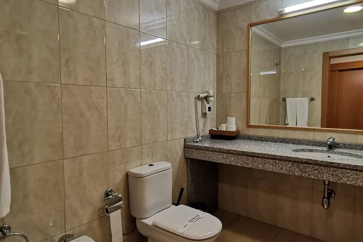 free toiletries, hair dryer, bidet, towels