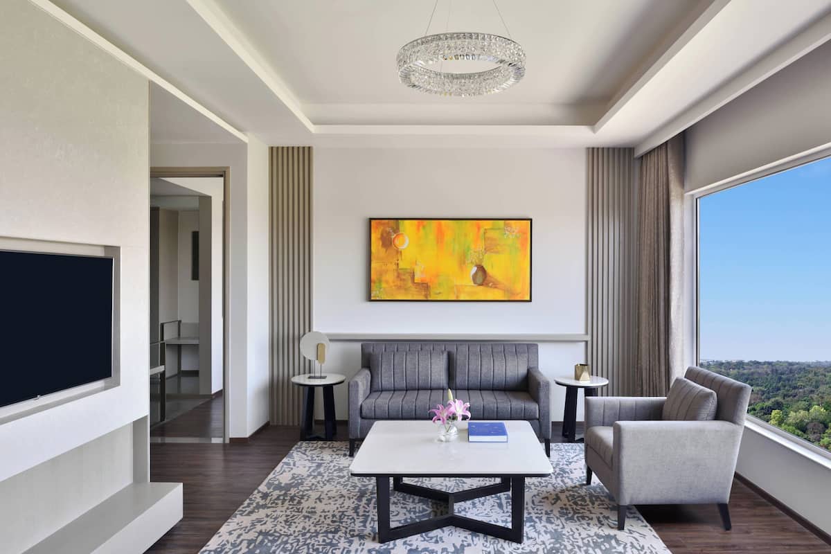 Executive Suite, 1 Bedroom, Non Smoking | Living room | 40-inch TV with cable channels, DVD player, iPod dock