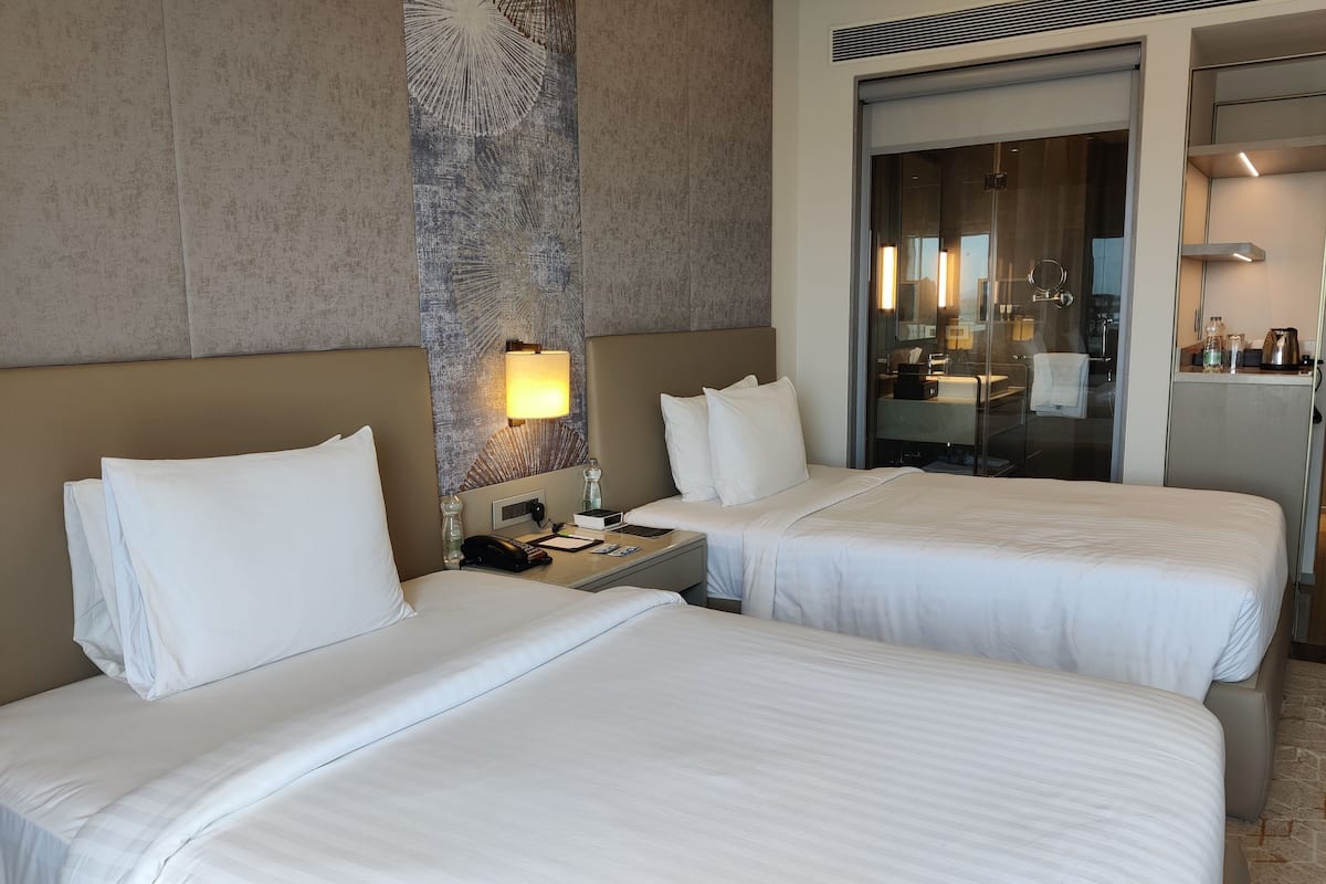 premium room, 2 single beds | 1 bedroom, minibar, in-room safe, desk