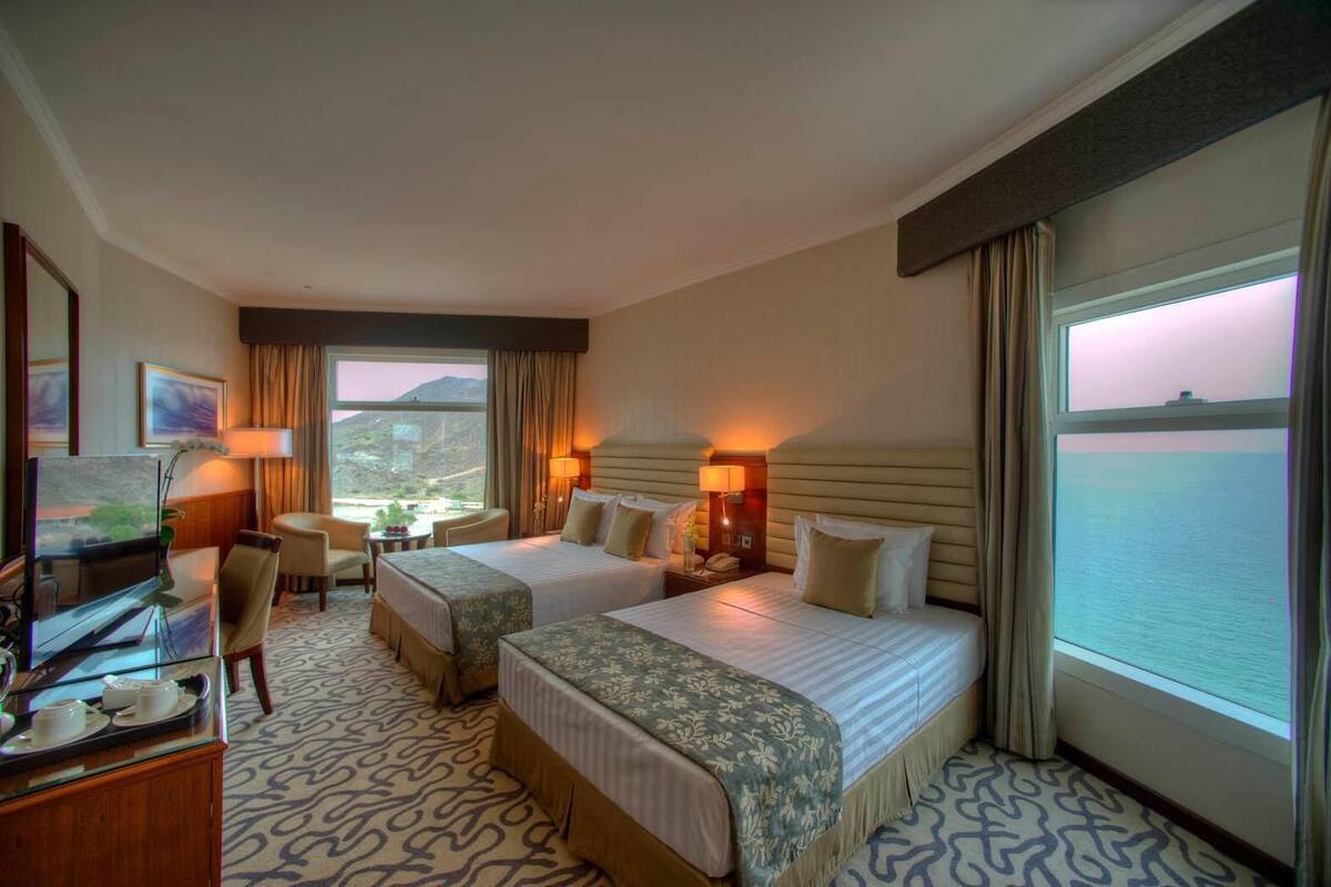 Deluxe Family Room Mountain View | Minibar, in-room safe, desk, laptop workspace