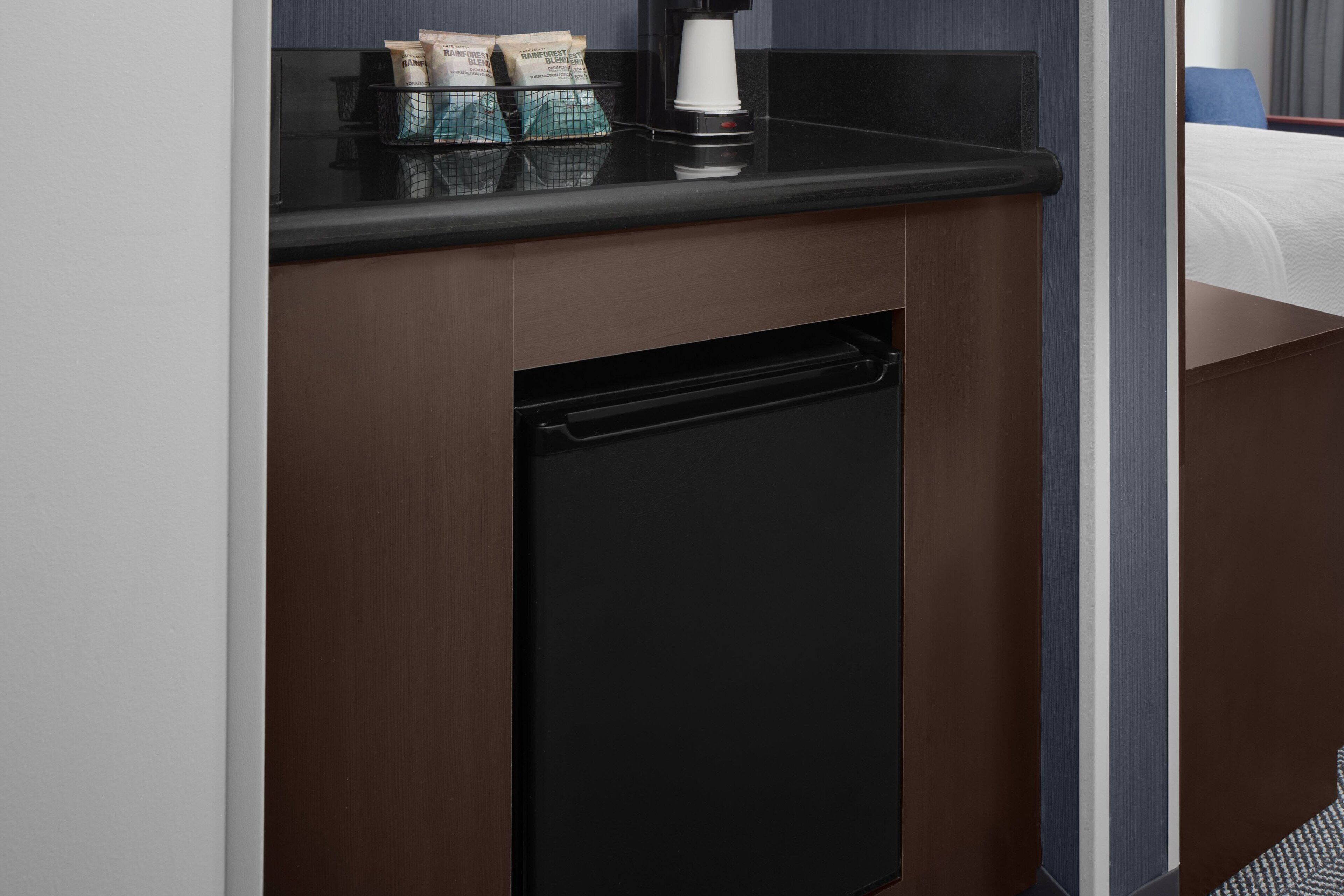 pillow-top beds, desk, blackout curtains, iron/ironing board