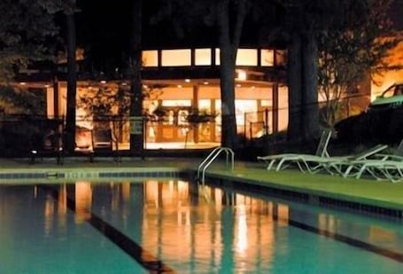 Seasonal outdoor pool. The Inn at Houndslake