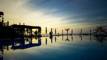 Outdoor pool, pool umbrellas, pool loungers