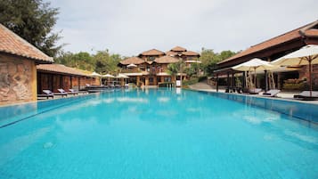 Outdoor pool, pool umbrellas, sun loungers