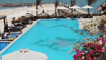 Outdoor pool, pool umbrellas, sun loungers