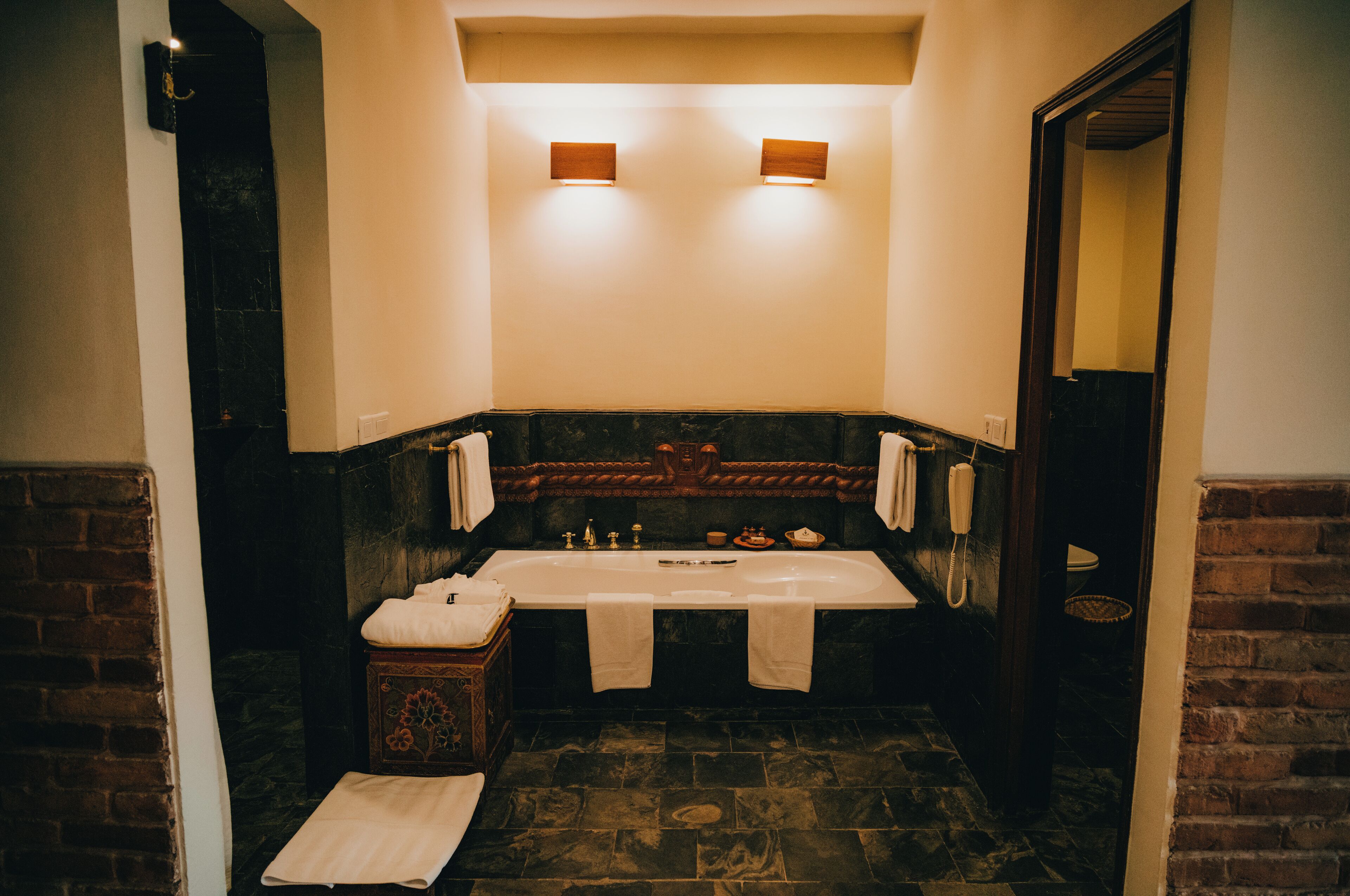 junior suite | bathroom | combined shower/bathtub, hair dryer, bathrobes, slippers