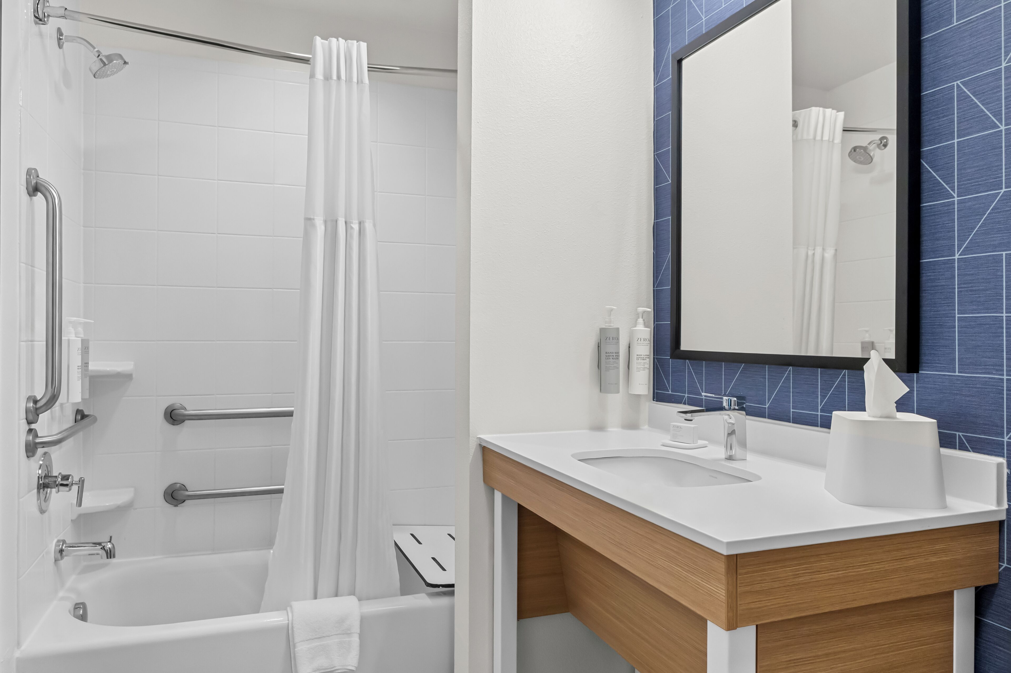 combined shower/bathtub, free toiletries, hair dryer, towels