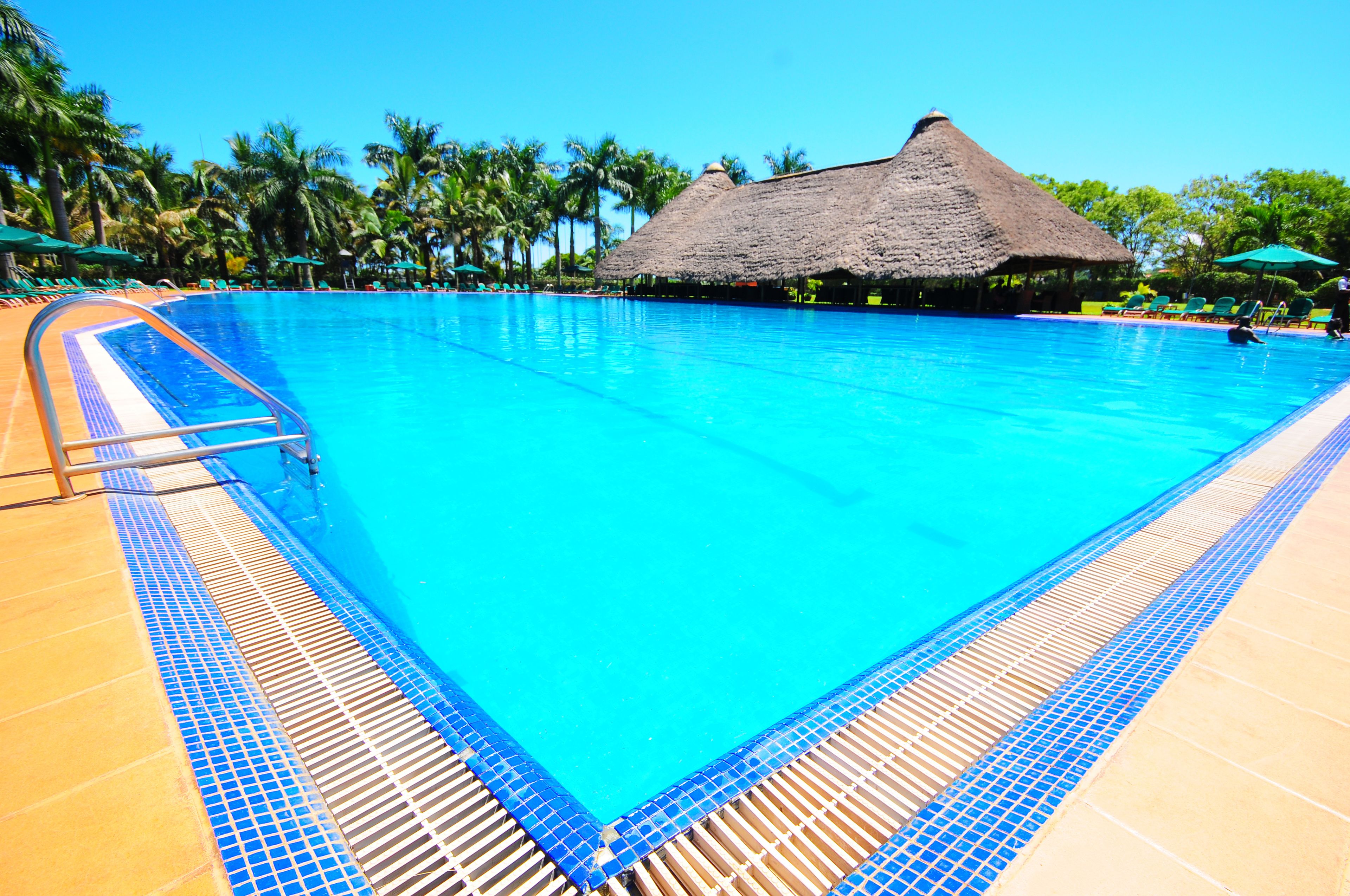 outdoor pool, pool umbrellas, pool loungers
