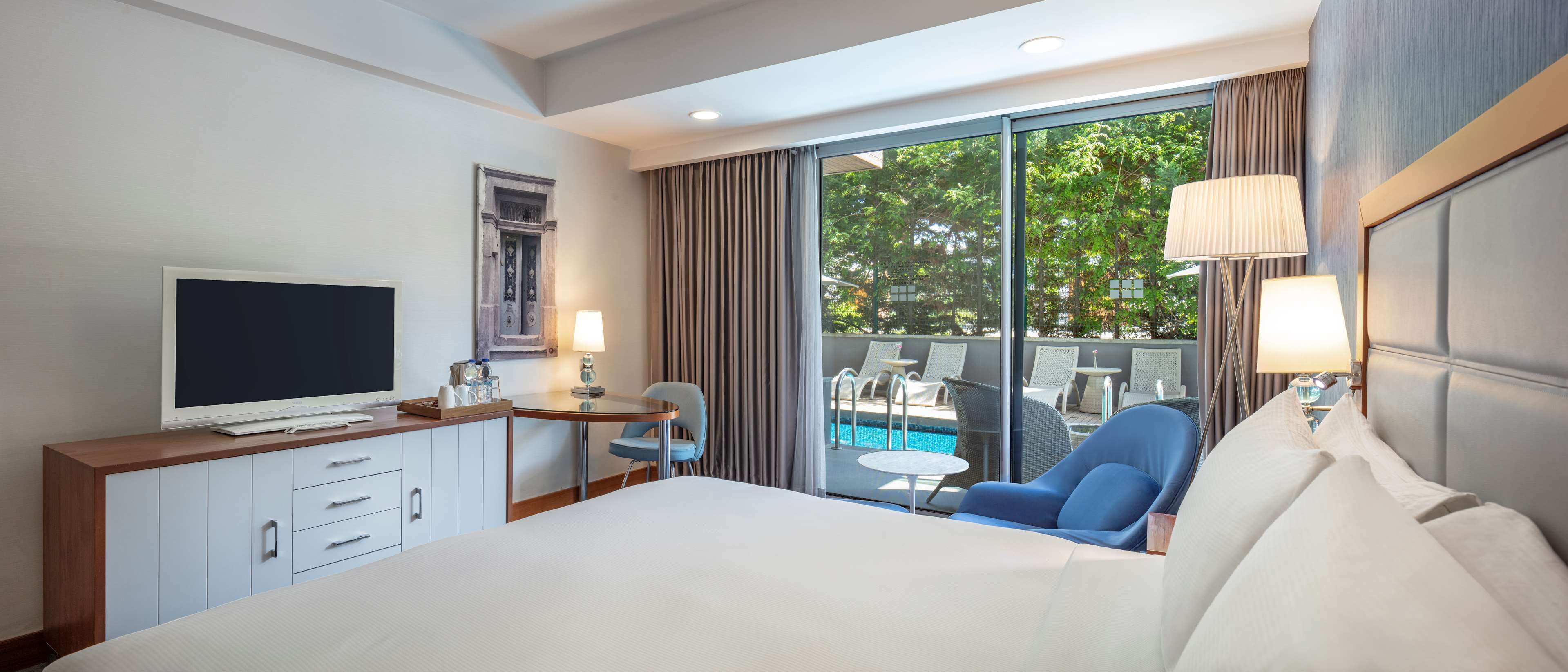 Rom – deluxe, 1 kingsize-seng (Shared Pool & Sun Deck) | Minibar, safe på rommet, skrivebord og wi-fi (mot et tillegg)