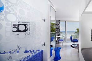 Premium bedding, down comforters, pillowtop beds, minibar