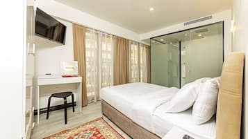 Ropa de cama de alta calidad y minibar