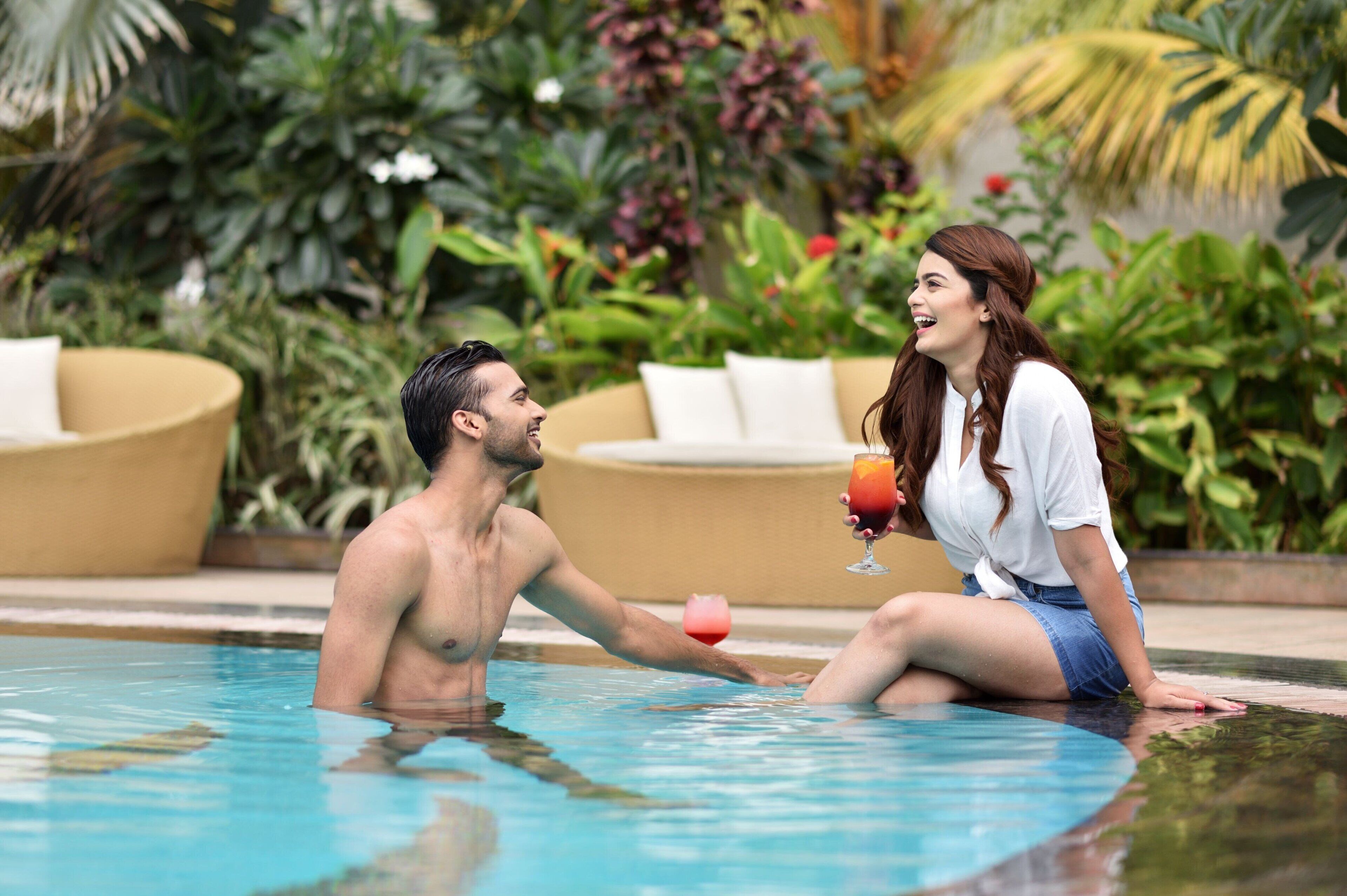 outdoor pool, open 6:00 am to 10:00 pm, pool loungers