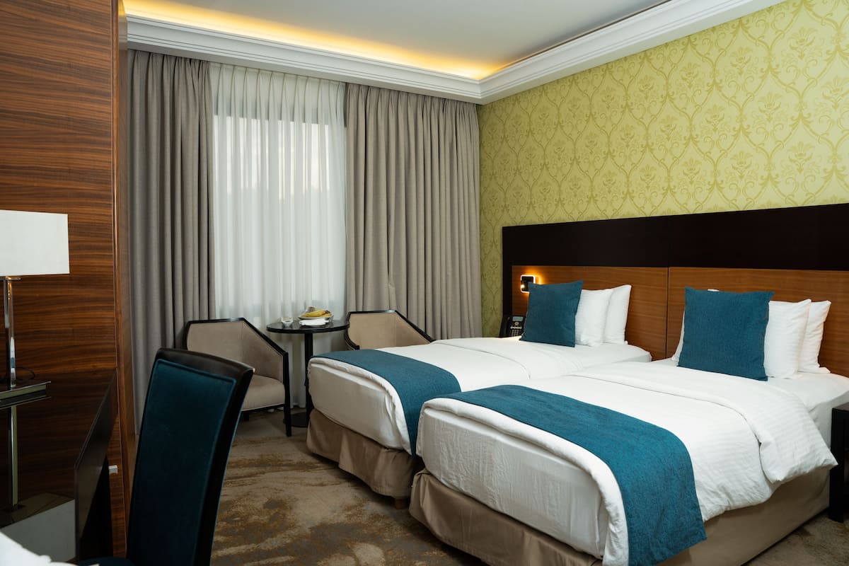 Egyptian cotton sheets, premium bedding, minibar, in-room safe