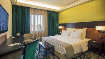 Egyptian cotton sheets, premium bedding, minibar, in-room safe