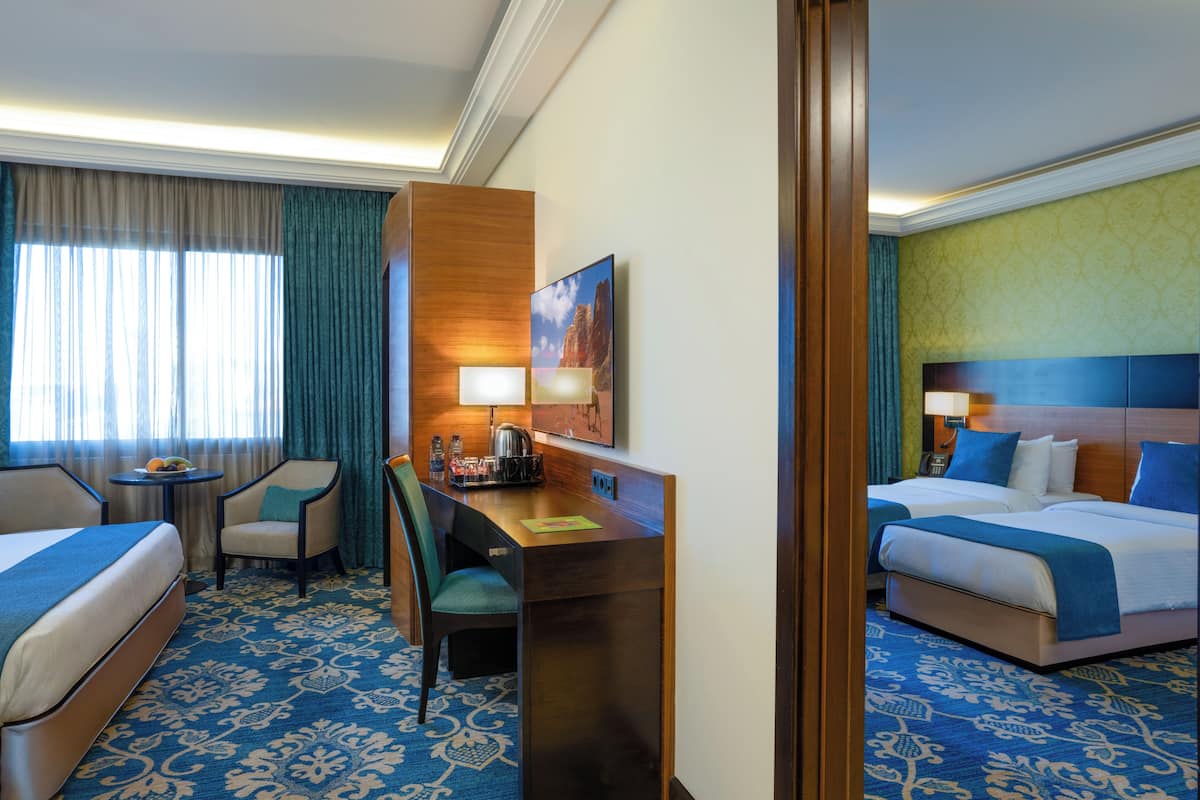 family room | egyptian cotton sheets, premium bedding, minibar, in-room safe