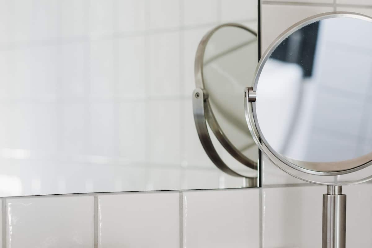 shower, designer toiletries, hair dryer, towels