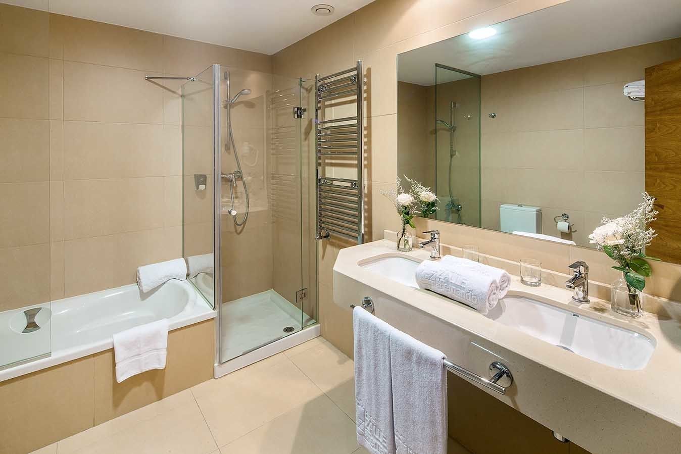 suite | bathroom | shower, rainfall showerhead, hair dryer, bidet