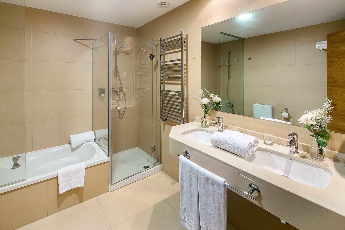suite | bathroom | shower, rainfall showerhead, hair dryer, bidet