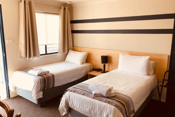 Minibar, desk, laptop workspace, iron/ironing board