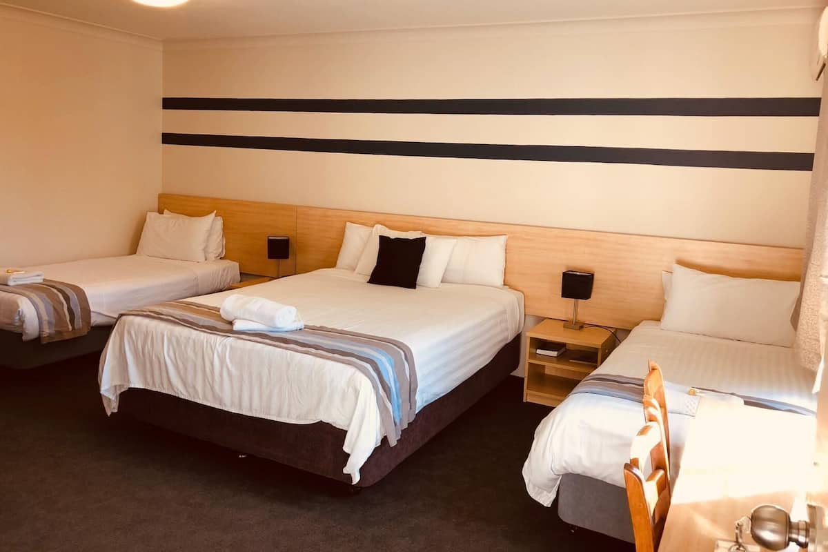 Minibar, desk, laptop workspace, iron/ironing board