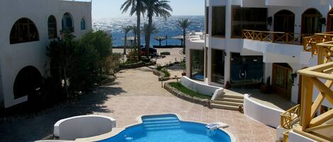 Indoor pool, outdoor pool, open 8 AM to 10 PM, free pool cabanas