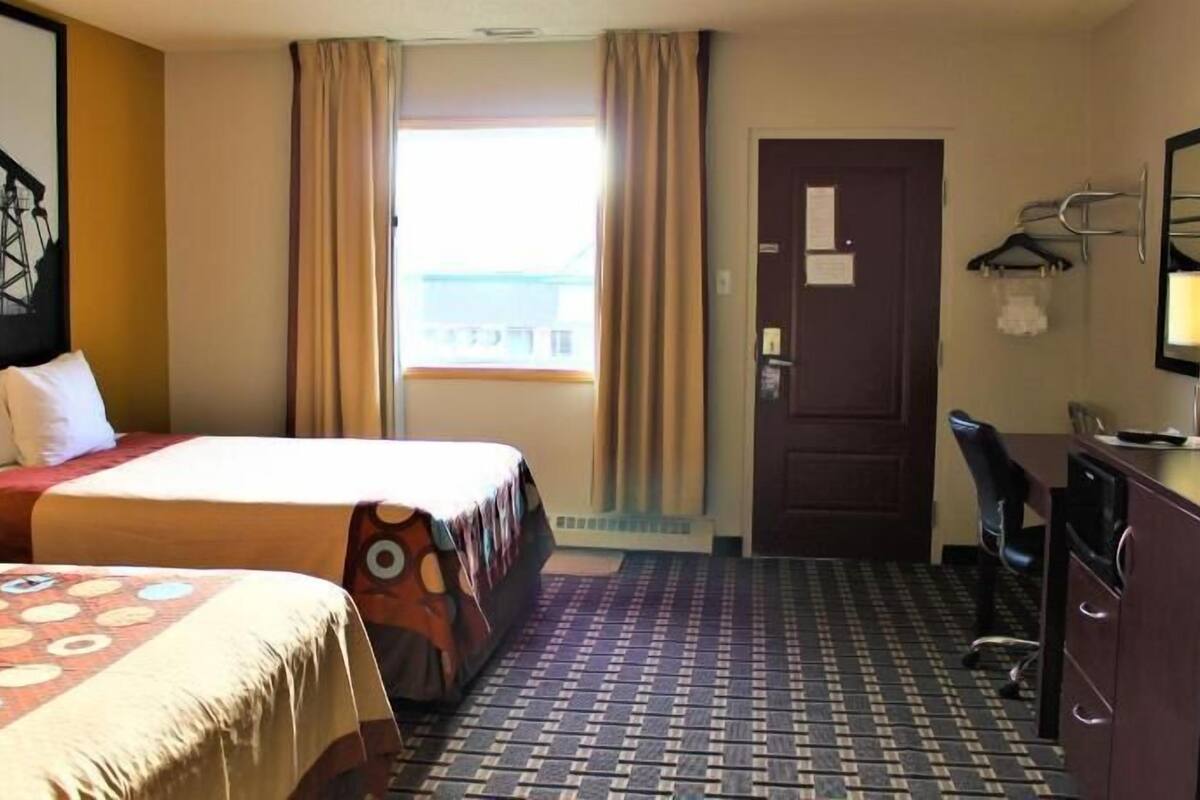 Desk, laptop workspace, blackout curtains, free WiFi